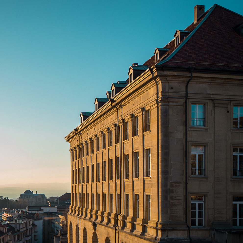 Sun lit house of an older origin, classical house in the centre of Lausanne, Switzerland, in a sunny late afternoon, bathing in the sun. Facade being sunlit